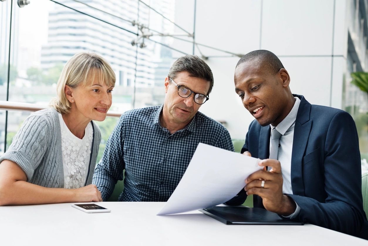 Team of professionals collaborating on insurance solutions